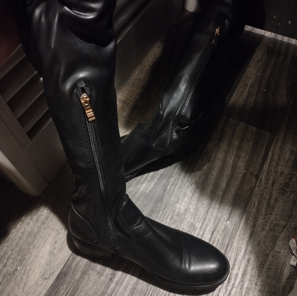 Black leather knee high boots